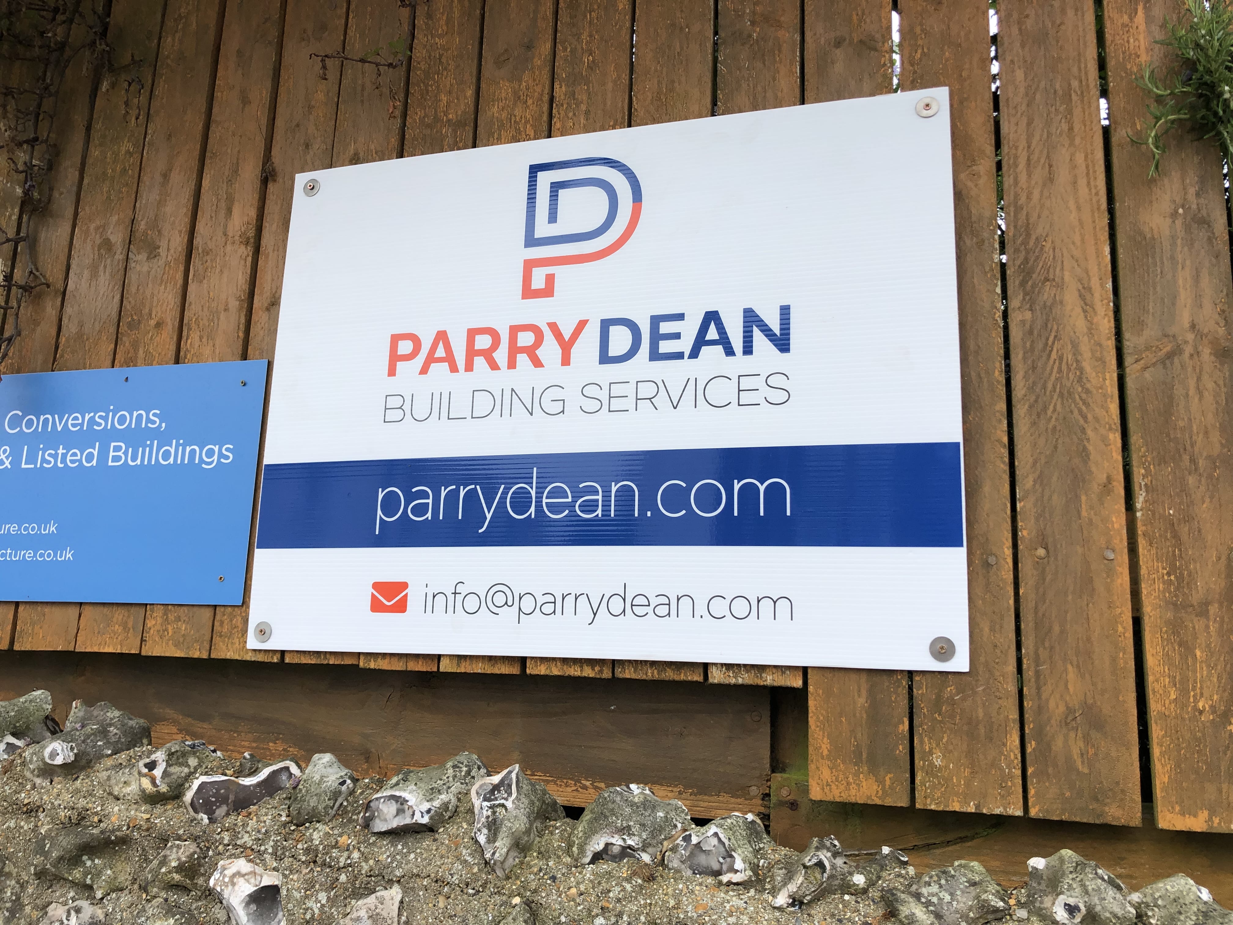 The Parry Dean work board displayed on the fence