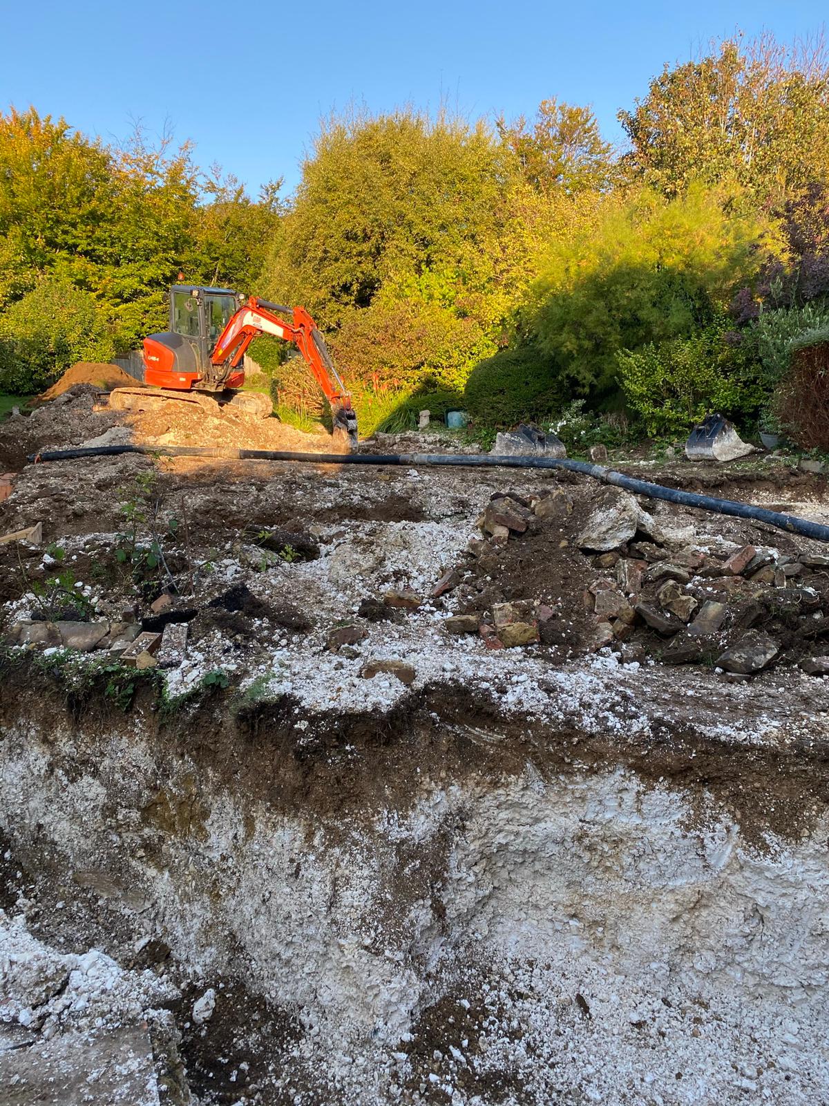 A digger digging trenches